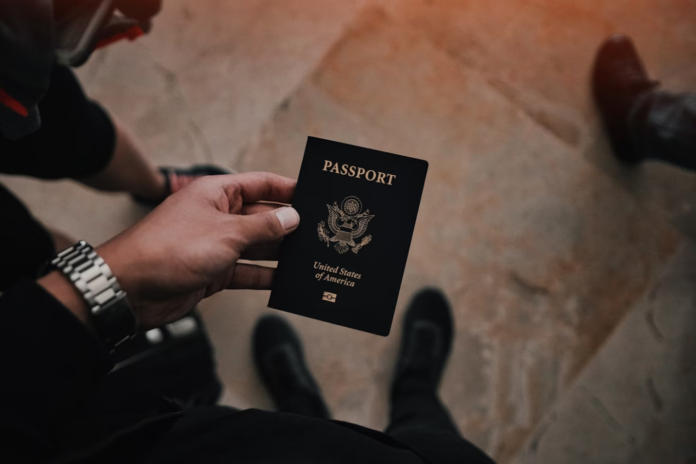 Man holding a passport