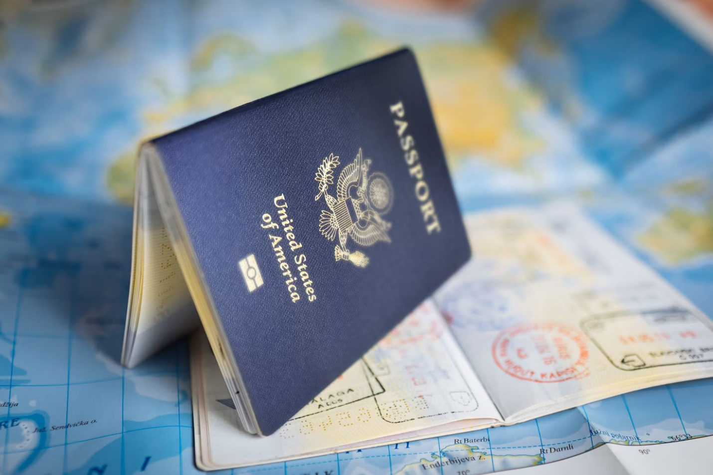 A passport on top of a map